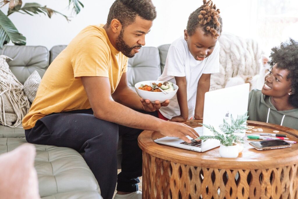 An African family planning their finances together at home