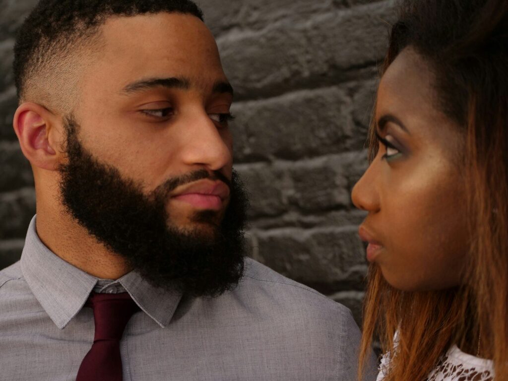 An African couple in a serious, honest conversation